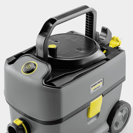 Grau-schwarzer Bodenstaubsauger mit ergonomischem Griff und Bedienknopf oben.