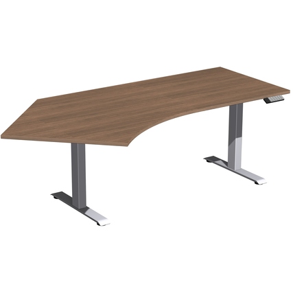 Schreibtisch in Nussbaum-Optik mit silbernen Füßen und freiformigem Design.