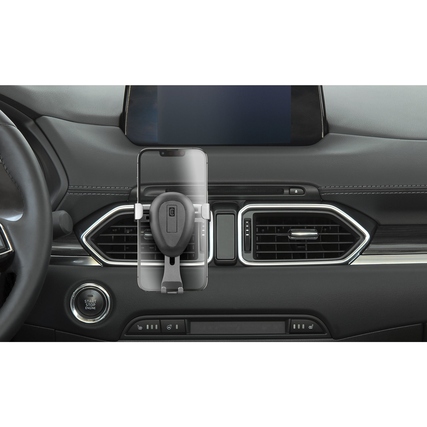 Kfz-Halterung für Smartphone an Lüftungsgitter im Auto mit Smartphone im Einsatz.