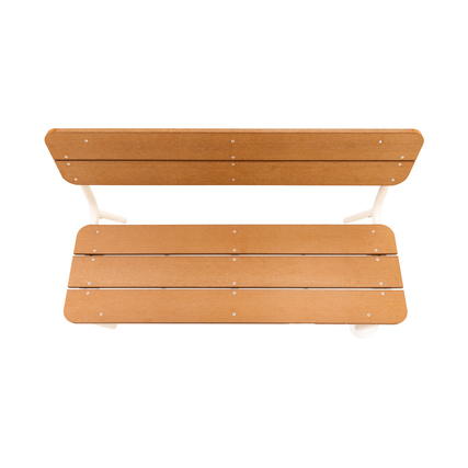 Hellbraune Gartenbank aus Polywood mit weißen Metallbeinen, Ansicht von oben.