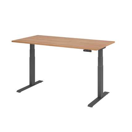 Schreibtisch in Nussbaum-Optik mit grauen Säulen und Bedienteil mit Taster.
