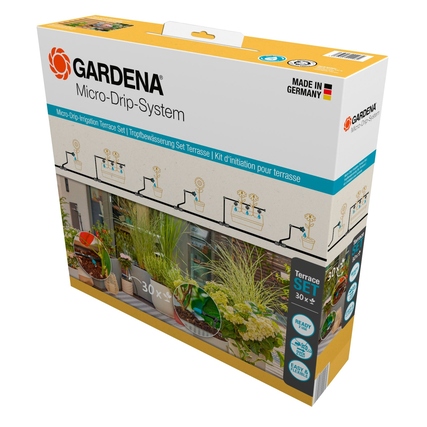 GARDENA Tropfbewässerung Set Terrasse in Verpackung mit verschiedenen Installationsbeispielen.