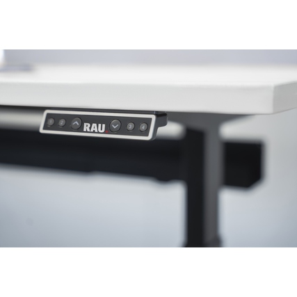 Nahaufnahme des Bedienelements für die elektrische Höhenverstellung eines Schreibtischs.