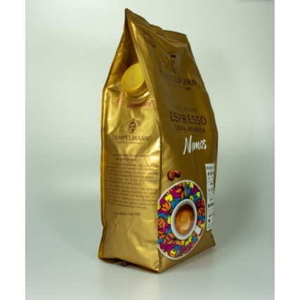Goldene Verpackung von TEMPELMANN Espresso Nomos mit buntem Kaffeetassen-Motiv.