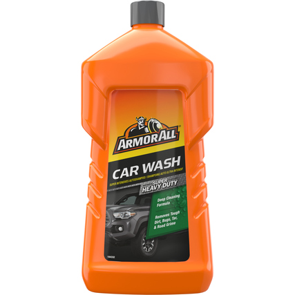Orangene Flasche mit schwarzer Etikettierung für autowaschtechnisches Produkt.