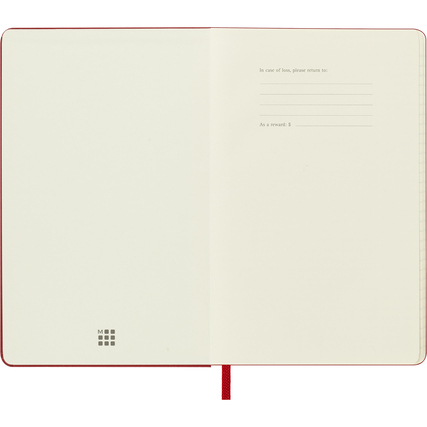 Offene Ausgabe eines scharlachroten Moleskine Buchkalenders mit leeren Seiten.