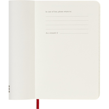 Offene Innenseite eines scharlachroten Moleskine Buchkalenders mit Platz für Kontaktdaten.