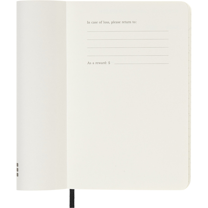 Offene Innenseite eines schwarzen Moleskine Buchkalenders mit Rückgabeinformationen.