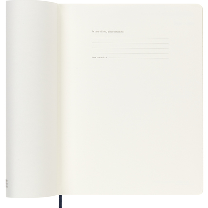 Offene Seitenansicht eines Moleskine Buchkalenders mit leeren linierten Notizseiten.