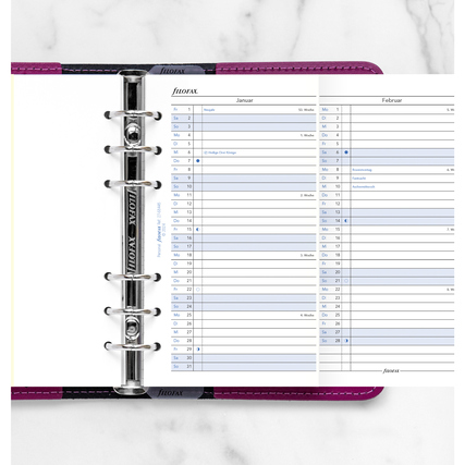 Offene Kalender-Einlage für 2027 mit Monatsansicht für Januar und Februar.