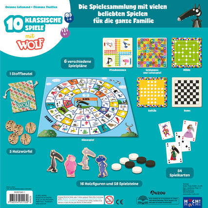 Spielesammlung mit Wolf, einschließlich Spielpläne, Figuren, Karten und Zubehör auf einem Tisch.