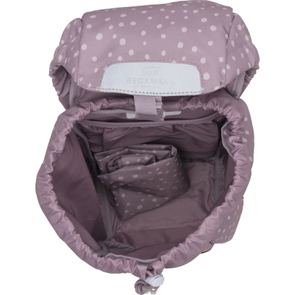 Innensicht eines lilafarbenen Rucksacks mit weißen Punkten und mehreren Fächern.
