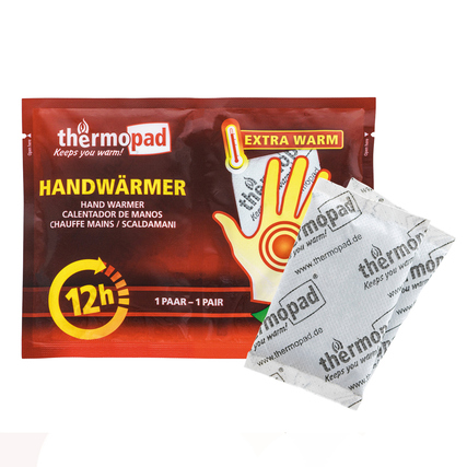 Paket mit einem Paar Handwärmern in rote Verpackung mit Symbol einer Hand.