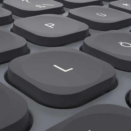 Nahaufnahme von Tasten einer kabellosen Tastatur in schwarzem Design.