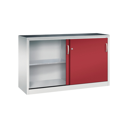 Werkzeugschrank mit einer roten Schiebetür und zwei Regalfächern, Seitenansicht.
