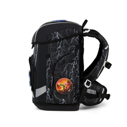 Schulranzen mit gewelltem Design, seitliche Taschen und bunten Klett-Elementen.