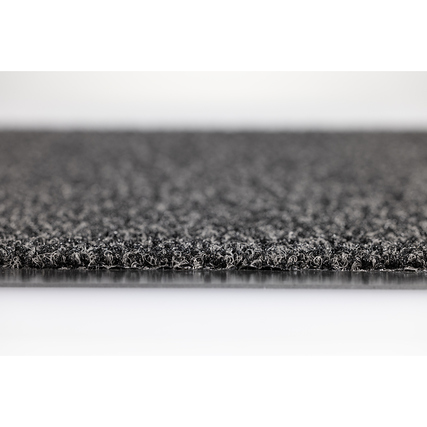 Schmutzfangmatte mit strukturierter Oberfläche und umlaufendem Rand, seitliche Ansicht.