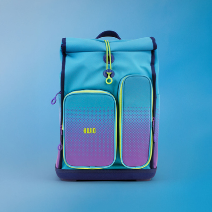 Schulranzen in Türkis mit violettem Punkteverlauf und neongelben Details, vorne zwei Taschen.