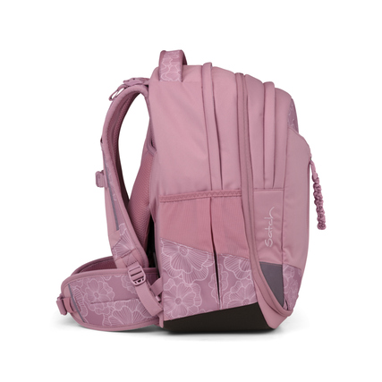 Satch Schulrucksack in rosa mit floralem Design, seitliche Ansicht.