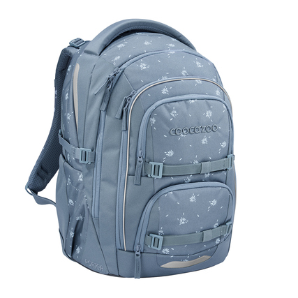 Blauer Schulrucksack mit verschiedenen Fächern und Blumenmuster, Seitenansicht.
