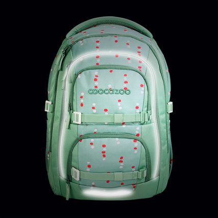 Schulrucksack in Mintgrün mit Punkten und reflektierenden Flächen, Vorderansicht.