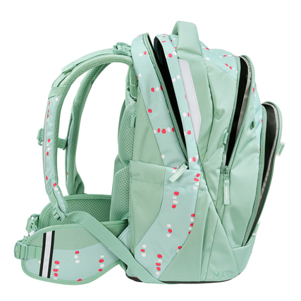 COOCAZOO Schulrucksack MATE in mintgrüner Farbe mit bunten Punkten, seitliche Ansicht.