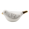 Dekorationsfigur in Form eines Vogels mit Aufschrift "Viel Glück" und goldfarbenem Schnabel.