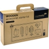 Kartonverpackung eines Whiteboard-Zubehörsets mit Holzaccessoires und Umweltsymbol.