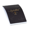 Schwarzer Briefblock mit goldener Schrift "Signature" im oberen Bereich.