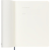 Offene Seitenansicht eines Moleskine Buchkalenders mit leeren linierten Notizseiten.