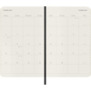 Aufgeschlagener Taschenkalender im DIN A6 Format, Monat Februar mit Kalendertagen und Notizen.