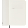 Offene Seite eines schwarzen Moleskine Buchkalenders mit Hinweis für Verlustmeldungen.